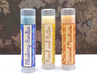 ¡Bálsamos extra de la colección Invierno 2026! Elige entre Sundae de Arándanos, Pan con Mantequilla o Macchiato de Caramelo.