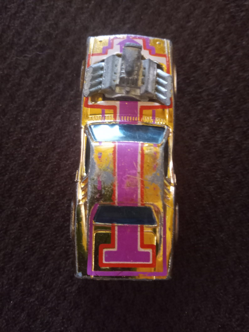 1977 Hot Wheels Flying Colors Gold Chrome Rodger Dodger Blackwall Tires