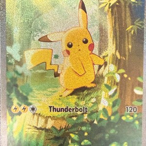 May include: A Pikachu ex trading card featuring a yellow Pikachu character standing in a green forest setting. The card displays the text Pikachu ex, 200 HP, Thunderbolt 120, and includes a lightning energy symbol. The card has a metallic finish.