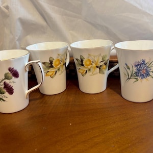 Set of four Duchess Bone China collectible cups
