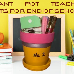 May include: A yellow, pink, and gray plant pot with the number "No. 2" written on it. The pot is filled with school supplies and sits in front of a chalkboard. The words "PLANT POT TEACHER GIFTS FOR END OF SCHOOL" are at the top.