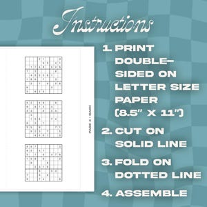 May include: A printed page with Sudoku puzzles and instructions. The instructions read: Print double-sided on letter size paper (8.5" x 11"). Cut on solid line. Fold on dotted line. Assemble.