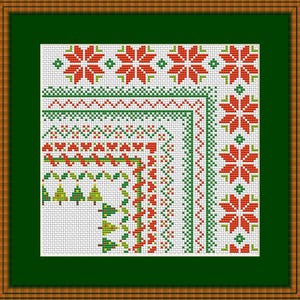 May include: A framed cross-stitch design with a Christmas theme. The design features red and green snowflake and tree patterns on a white background. The frame is brown with a dark green mount.