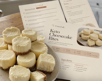 Op de afbeelding: Een bord met ronde, lichtgekleurde keto cheesecake bites met een korstbodem, naast een geprinte receptenkaart getiteld CraveLab Keto Cheesecake Bites, met een overzicht van ingrediënten, instructies en bereidingsnotities.