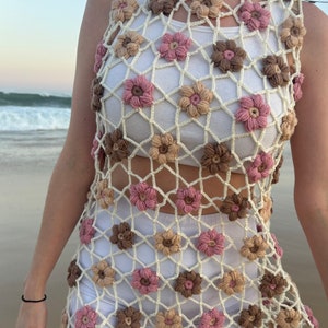 Flower crochet dress close-up at the beach.