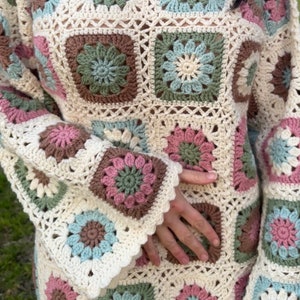Flower granny square crochet dress close up photo.