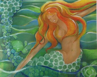 Teal tail redhead mermaid with playing with turtles