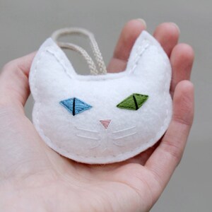 Cat Christmas Ornament Embroidered. White Cat Multi Colored Eyes in Blue and Green. Felt Cat Head Christmas Ornament for Cat Lover image 1