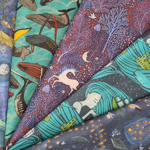 May include: A collection of colorful fabric scraps with various patterns, including a whimsical unicorn, a mermaid, and a floral design. The fabrics are arranged in a layered, overlapping pattern, creating a visually appealing and textured composition.