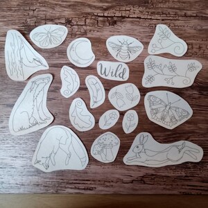 Selection of 18 Wildlife Stick & Stitch embroidery patterns on self adhesive water soluble stabilizer - badger, fox, hare, butterfly, leaves.