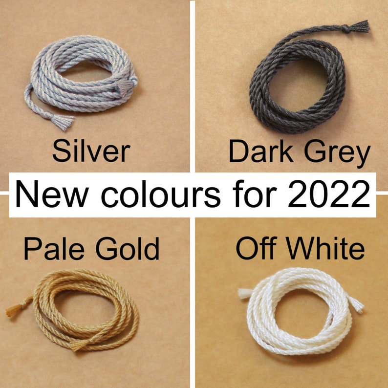 Colour chart for Colour chart for Pack of 2 handmade pure silk cords (2mm wide) showing silver, dark grey, pale gold and off white.