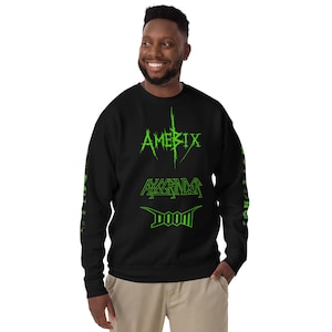 May include: Black sweatshirt with green text on the front. The text reads "AMERICA", "AXEGRINDER", and "DOOM".