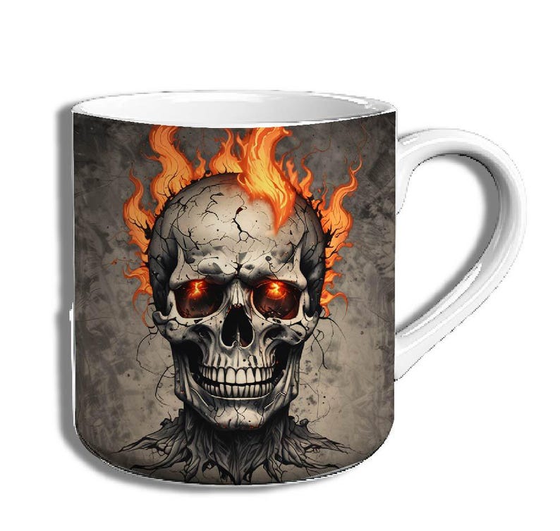 May include: White ceramic mug with a skull design. The skull is surrounded by flames and has glowing red eyes. The background is a gray and white textured design.
