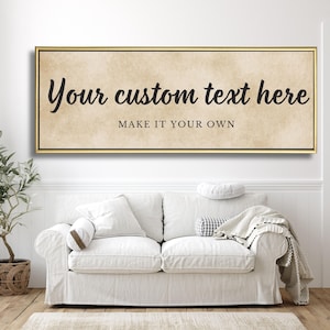 May include: A rectangular framed sign with the text "Your custom text here" in a black, cursive font. Below the text is the phrase "MAKE IT YOUR OWN" in a smaller, sans-serif font. The background is a beige, textured pattern.