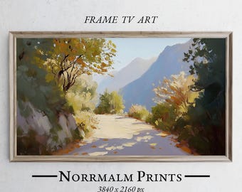 May include: A framed landscape painting depicts a sunlit road winding through a valley, flanked by trees and mountains. The artwork features a palette of greens, yellows, and blues, with the text "FRAME TV ART" and "Norrmalm Prints" displayed.