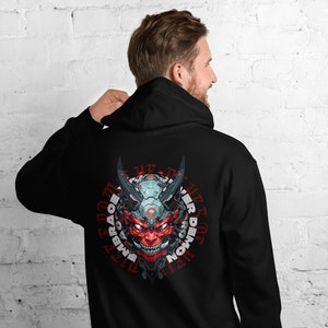 May include: Black hooded sweatshirt with a red and grey demon graphic on the back. The graphic is surrounded by a circle with the text "Embrace the life of the demon within".