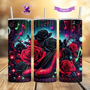 May include: A stainless steel tumbler with a colorful design featuring red roses, black roses, and a pair of red shoes. The background is a vibrant blue and green with musical notes and a grid pattern.