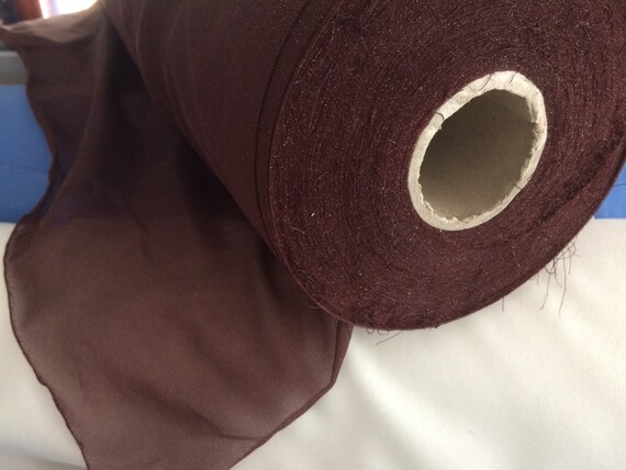 Lightweight synthetic fusible iron-on interfacing fabric in dark brown; for  garments