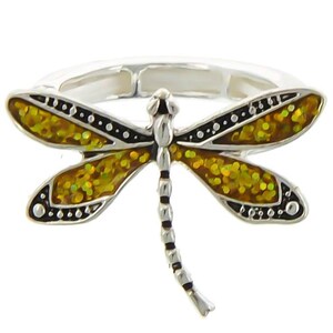 May include: A silver ring with a dragonfly design. The dragonfly's wings are yellow and green with black accents.