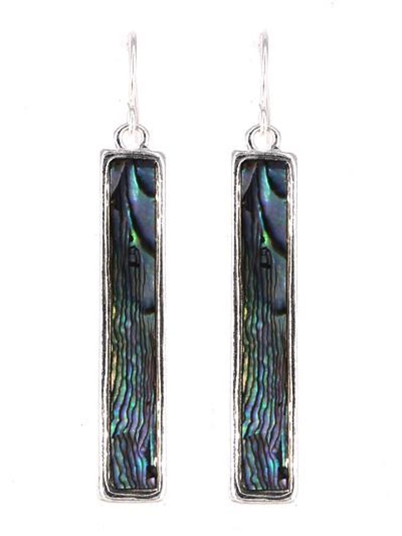May include: A pair of rectangular dangle earrings. Each earring features a silver-toned frame surrounding a shimmering, iridescent abalone shell inlay. The abalone displays shades of blue, green, and purple. The earrings hang from a simple hook.