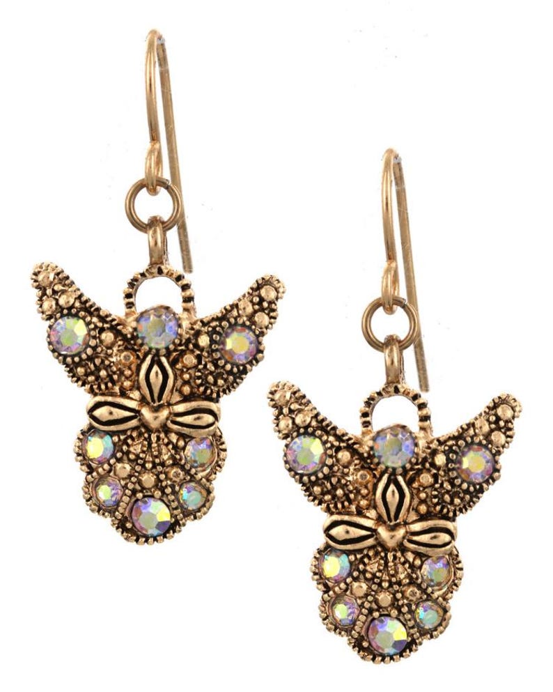 May include: A pair of gold-tone angel dangle earrings with iridescent crystal accents.