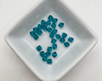 6mm Bicone Blue Zircon Colored Swarovski Crystal Beads - about 29 beads G246