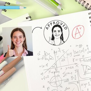 May include: A white sheet of paper with handwritten math equations and a drawing of a right triangle. The paper has a red circle with a white "A+" inside and a black circle with the word "APPROVED" and a line drawing of a person giving a thumbs up inside.