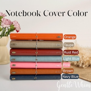 May include: A selection of leather-bound notebooks in shades of orange, taupe, rust red, light blue, pink, brown, and navy blue. Each notebook has a string closure. The image displays the text "Notebook Cover Color" at the top.
