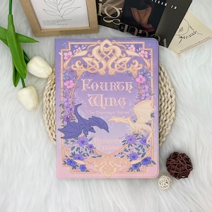 May include: A purple and gold book cover with a floral design. The title is "Fourth Wing" and the subtitle is "The Empyrean Series" by Rebecca Yarros.