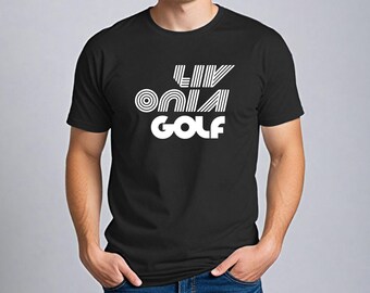 May include: Black t-shirt with the white text "LIV ON GOLF" in a bold, stylized font. The shirt is short-sleeved and appears to be made of a soft material. The design is centered on the chest.