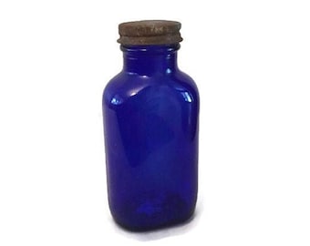 Hazel Atlas cobalt blue glass bottle 5.5 inches- Rusty lid