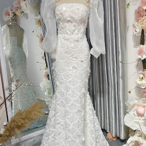 Custom Ivory Mermaid Wedding Dress In Premium Floral Lace Fabric With Romantic Tulle Puff Sleeves And Figure-Flattering Cutout At The Waist