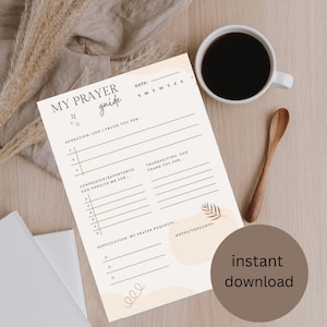May include: Printable prayer guide with a beige background and brown text. The guide includes sections for adoration, confession, thanksgiving, and supplication. It also includes a section for notes and thoughts.