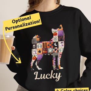 May include: A black long-sleeve sweatshirt featuring a dog silhouette filled with a patchwork pattern of Halloween icons including pumpkins, ghosts, skulls, and spiderwebs. The name Lucky is printed in white below the dog graphic.