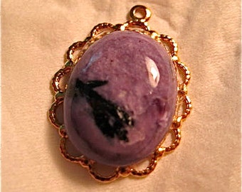 Purple and Black Flecked Stone Pendant