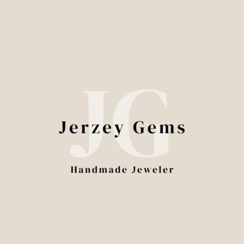 May include: A logo design on a light beige background featuring the large, pale, semi-transparent letters JG in the center. Overlaid in black text is the name Jerzey Gems, with the words Handmade Jeweler positioned directly underneath in black.