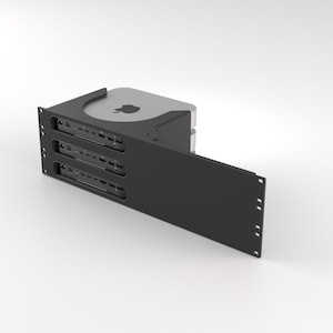 May include: A black rack mount for a computer, with a silver computer visible. The rack has three rows of ports and a sliding front panel. The computer has a silver top with a black apple logo.