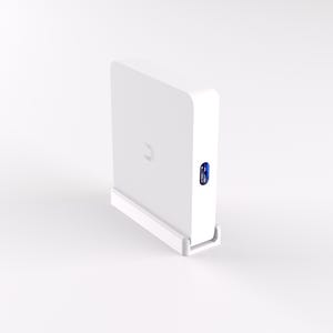 May include: A white square-shaped device with a blue USB port on the side. The device is sitting on a white stand.