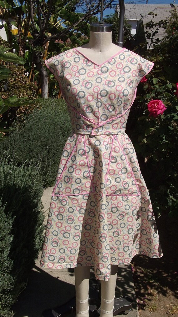 Items similar to Swirl style 1950s wrap dress made in your choice of fabrics on Etsy