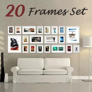 May include: A set of 20 white picture frames arranged in a gallery wall layout on a wall. The text 20 Frames Set is displayed in large dark red and black font above the collection of various rectangular frames containing movie posters.
