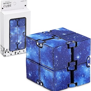 May include: An Infinity Cube toy with a blue galaxy design. The cube is shown folded and unfolded, with the packaging visible. The packaging reads "INFINITY CUBE" and "AGES 3+".