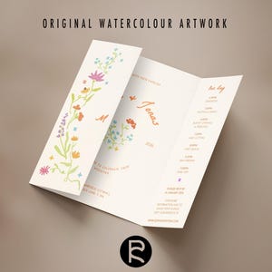 May include: Cream-colored wedding invitation with watercolor floral accents. The invitation unfolds to reveal event details, including the names "M" and "Jonas", and the text "Original Watercolour Artwork". The design features a delicate floral border.