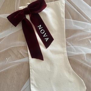 Personalised stocking with velvet name ribbon