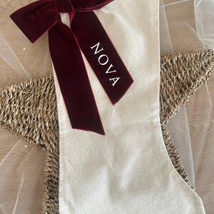 Personalised Christmas stocking with velvet name ribbon