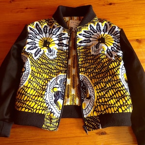 African Ankara child's baby lined cotton bomber jacket with black satin sleeves