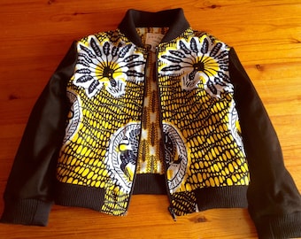 African Ankara child's baby lined cotton bomber jacket with black satin sleeves