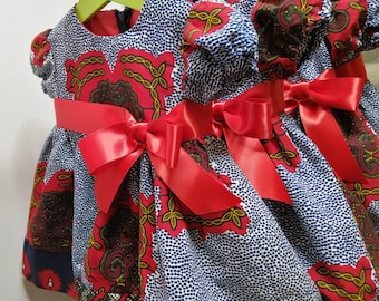 Girls party dress Special occasion toddlers African Ankara dress with red ribbon trim and contrasting hem
