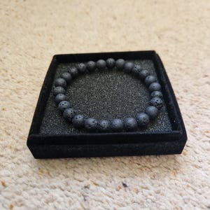 Natural black 8mm volcanic lava beaded handmade stretch bracelet