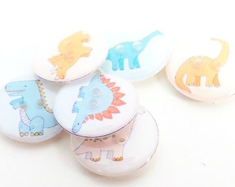 HANDMADE BUTTONS. Set of 6 Assorted Pastel Colured Dinosaur Sewing Buttons.  Washer and Dryer Safe.  Two Holes.  3/4" or 20 mm Round.