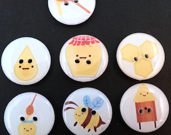 7 Honey Bee Buttons. Assorted Bee and Honey Themed Buttons.